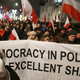 Supporters of the ruling Law and Justice party hold a pretty inaccurate sign at a pro-government rally in Warsaw, Poland, on Dec. 18. Image via AP Photo/Czarek Sokolowski.